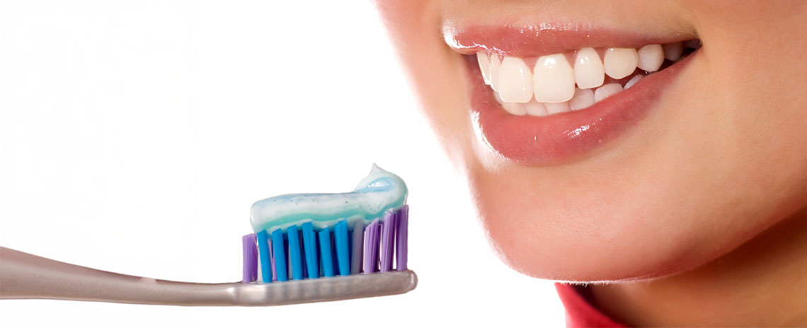 Women about to brush her teeth in Livermore